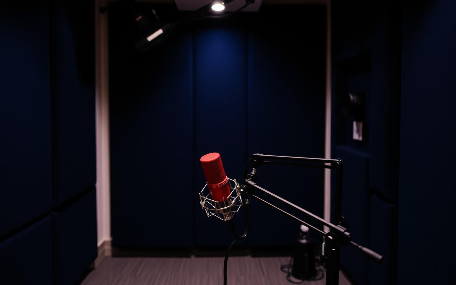 Podcast studio with red microphone